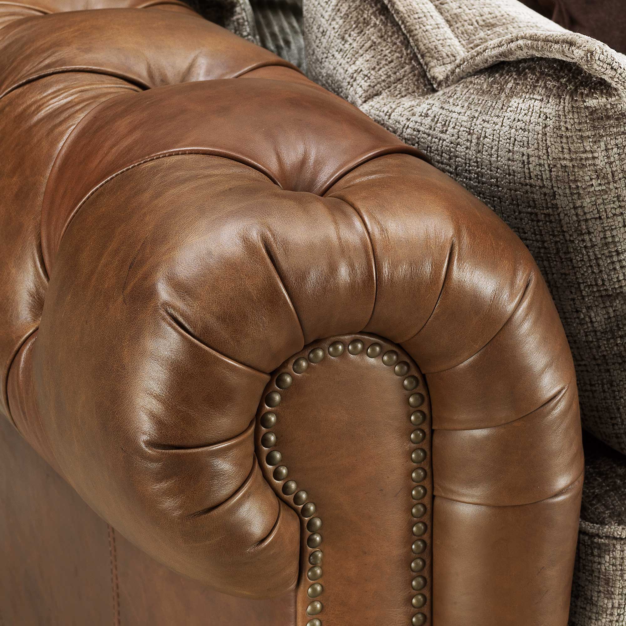 Taunton Brown Leather Snuggle Chair with Fabric Seat Cushion, In Roaming Valley body, Antique Brass Studs